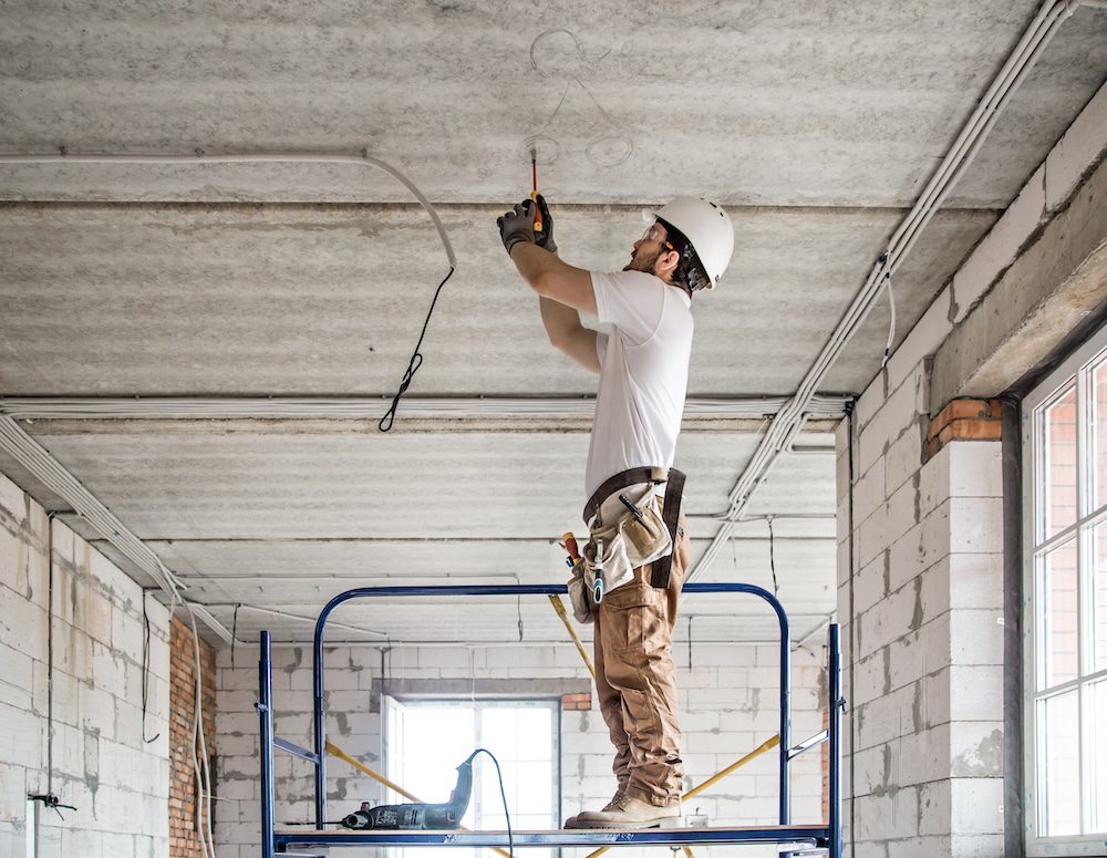Commercial electrician in Port Moody working on the construction site